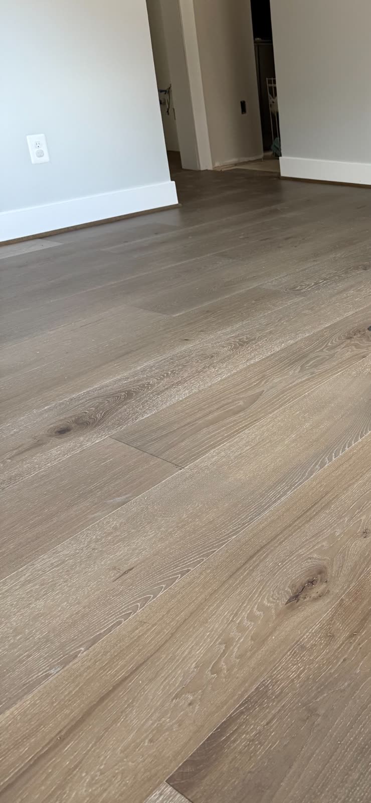 Wide-plank hardwood flooring installation